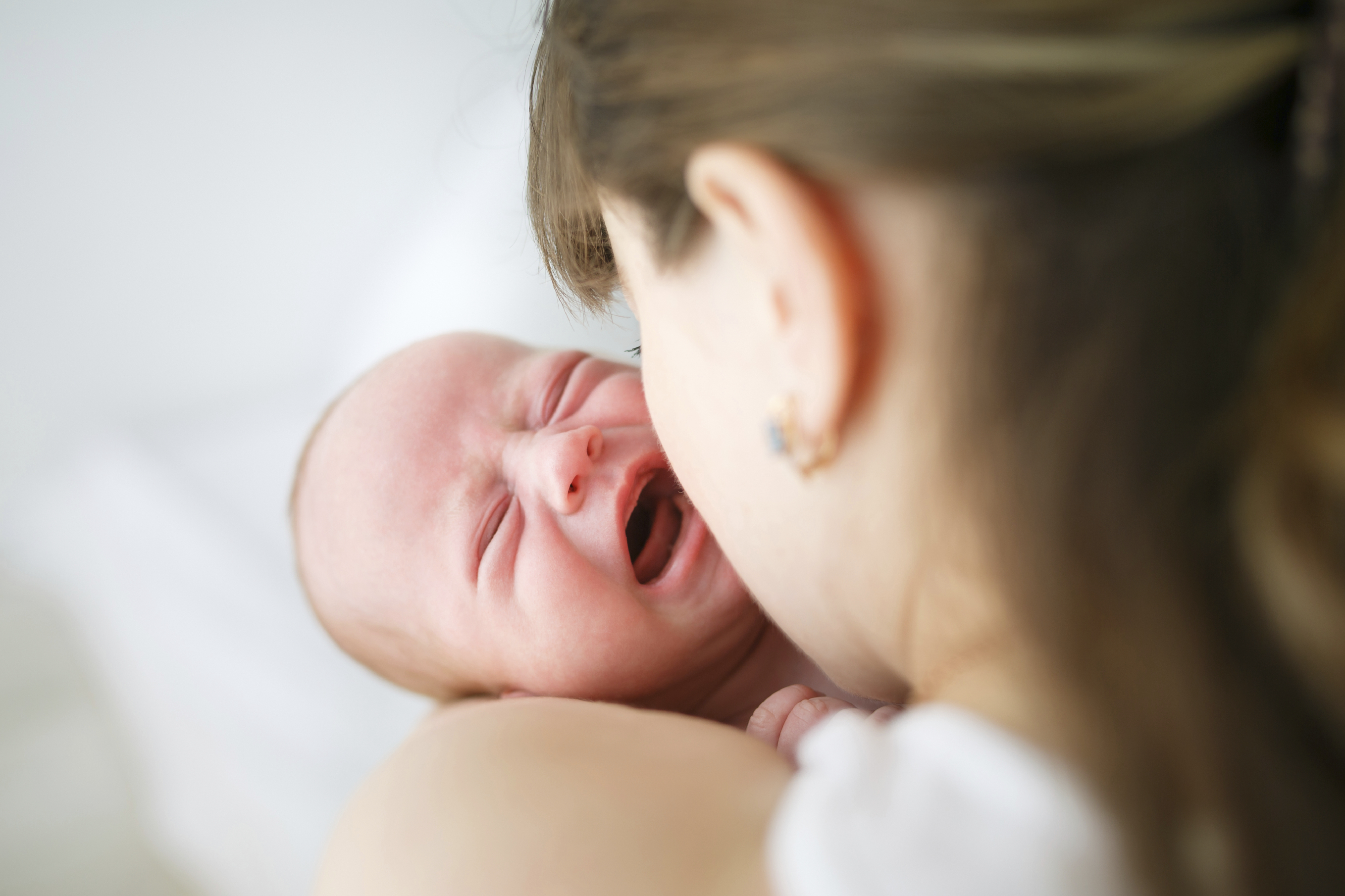 unsettled newborn 3 weeks